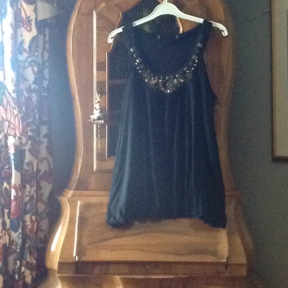 Black top with neck decoration